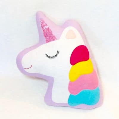 unicorn magical head pillow, with sparkly horn.