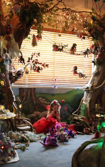 Fairy Bedroom with little girl surrounded by fairies.