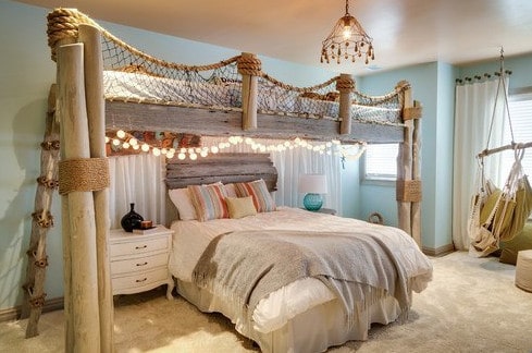 beach themed bedroom idea decor, with netting and cool theme.